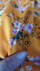 Viscoza Spun fond Portocaliu cu flori Alb/mov/Negru VIS1300